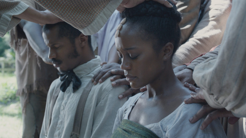 Nate Parker as "Nat Turner" and Aja Naomi King as "Cherry" in THE BIRTH OF A NATION. Photo courtesy of Fox Searchlight Pictures. © 2016 Twentieth Century Fox Film Corporation All Rights Reserved